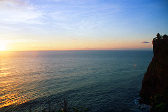 Bali Uluwatu temple at sunset panorama