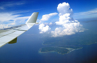 Garuda Indonesia McDonnell-Douglas MD11 (PK-GIJ)  flying over Borneo Island, Indonesia