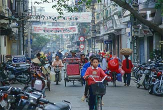 Hanoi - street scene with cyclo