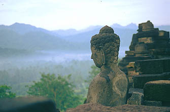 Yogjakarta Borobudur stone Buddha in meditation position
