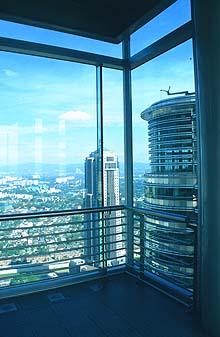 Petronas Twin Towers view from skybridge with Petronas Club