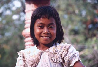 Phnom Penh: girl selling postcards