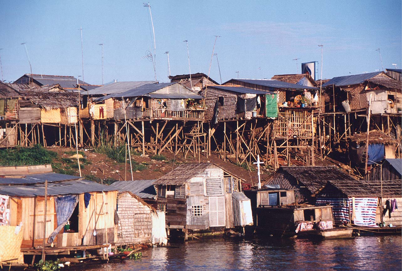 [Image: PNH_Phnom_Penh_houses_on_Tonle_Sap_river.jpg]