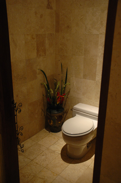 DPS Bali Ubud Bedulu Gubah Bali Exclusive Villas bathroom toilet with flowers 3008x2000