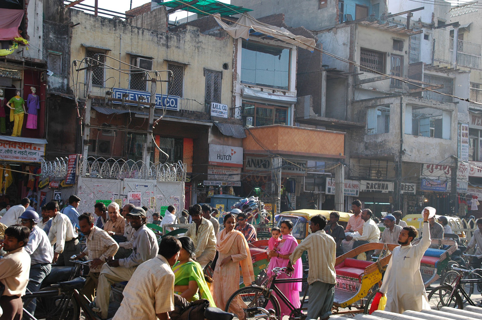 DEL Delhi - Chandni Chowk street shopping bazaar with busy people in colourful dress 3008x2000