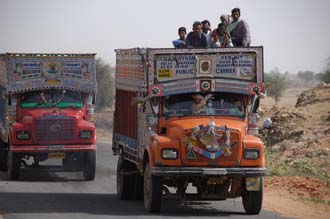 JAI - local bus truck with people on the roof on the road from Ranthambore National Park to Karauli 3008x2000