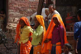 JAI Karauli in Rajasthan - group portrait women in colourful orange dress 3008x2000