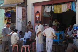 DEL Mandawa in Shekawati region - men meeting in local bar on the main street 3008x2000