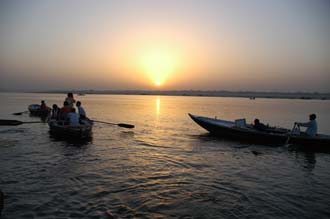 VNS Varanasi or Benares - sunrise over the holy river Ganges with boats 3008x2000