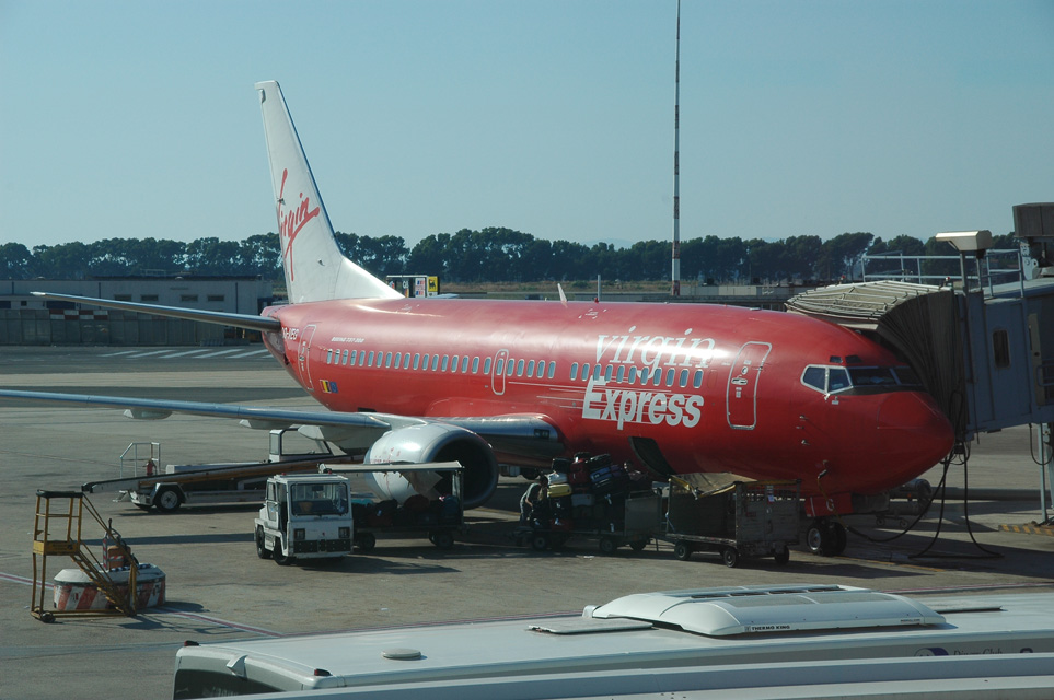 FCO Rome Fiumicino Airport - Virgin Express Boeing 737-300 aircraft at the gate 3008x2000