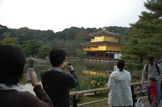 KIX Kyoto - japanese people photographing Kinkaku-ji or Golden Temple with garden and lake 3008x2000