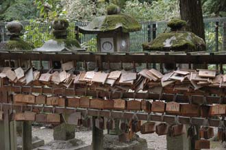 KIX Nara - small shrine Votive plaques or ema made of wood attached to boads on the shrine precincts 3008x2000