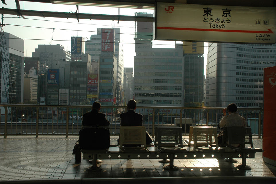 NRT Tokyo - waiting area with panorama view on Tokyo skyline on the Shinkansen bullet train platform of Tokyo station 3008x2000