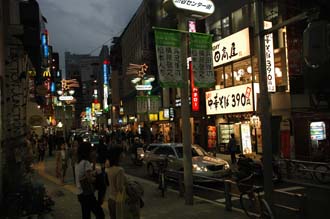 NRT Shibuya Tokyo - youth-oriented shopping district by night with colourful advertisement lights 03 3008x2000
