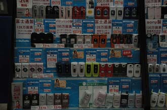 NRT Shinjuku Tokyo - mobile phones on sale near Shinjuku station 3008x2000