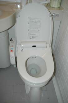 NRT Tokyo - japanese high-tech toilet in the Yaesu Terminal Hotel with flatscreen LCD TV 3008x2000