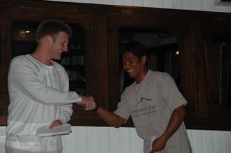 AMI Lombok Ombak Putih sailing ship captains dinner Martin handing out the tips 5 3008x2000