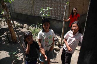 AMI Lombok Pringgasela traditional weaving village laughing kids 3008x2000