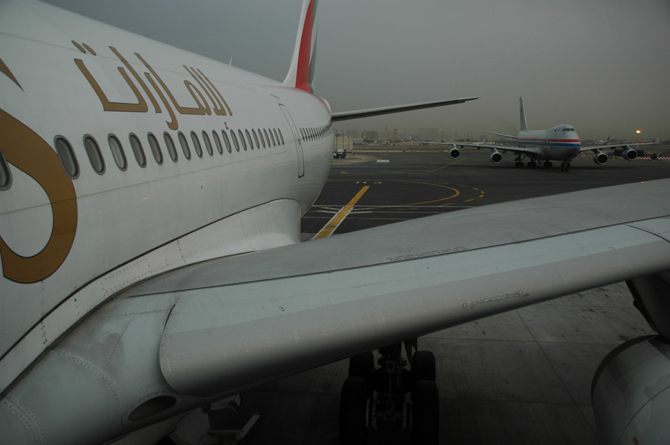 DXB Dubai International Airport - Emirates Airlines Airbus A330-200 aircraft with Cargolux Boeing 747-200 aircraft with winglets 3008x2000