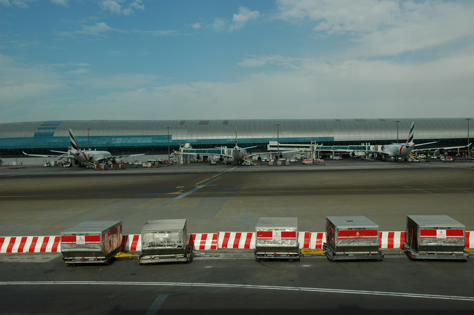 DXB Dubai International Airport - Terminal 1 with aircrafts at the gates 01 3008x2000