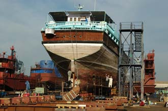 DXB Dubai Al-Jaddaf dhow building yard - dhow repair in the dry-dock 01 3008x2000