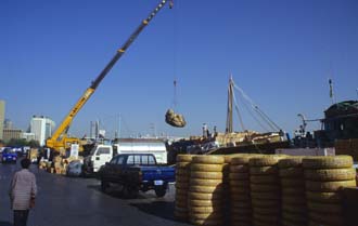 DXB Dubai - Deira dhow wharfage with crane loading cargo 01 5340x3400