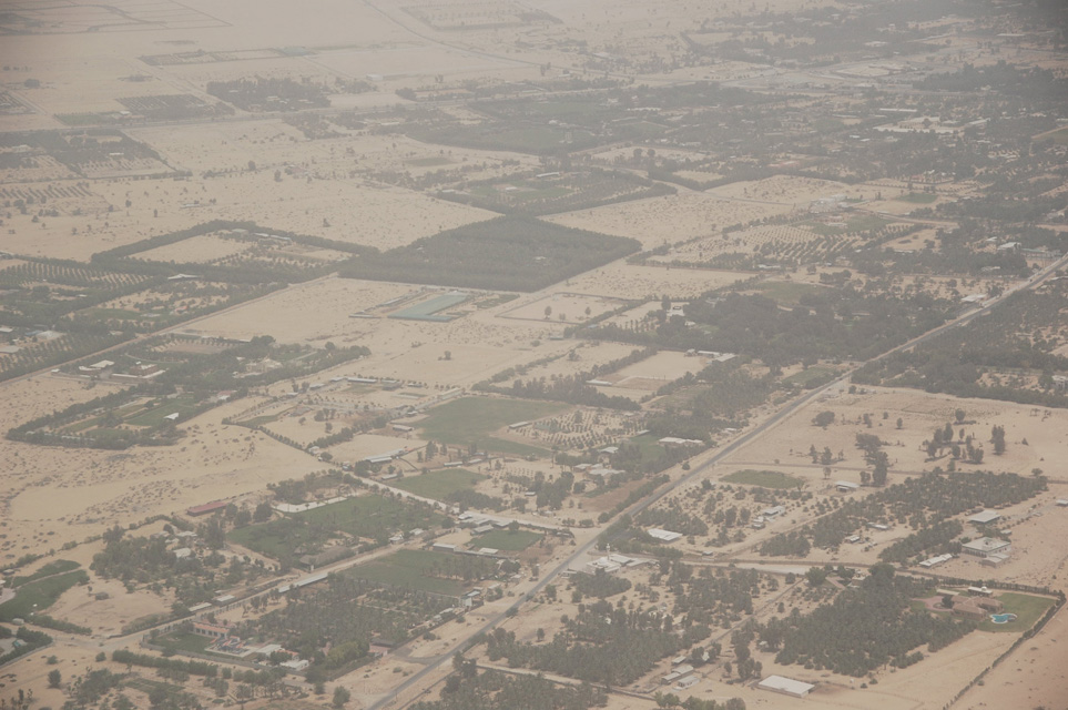 DXB Dubai from aircraft - residential area with trees on the border with the desert 06 3008x2000