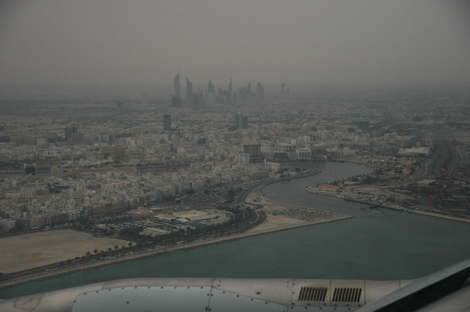 DXB Dubai from aircraft - the Dubai creek and the Jumeirah skyscrapers at dawn 3008x2000