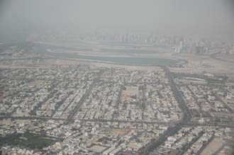 DXB Dubai from aircraft - Al Mamzar residential area and beach with Sharjah in the background 01 3008x2000