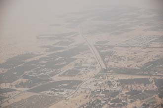 DXB Dubai from aircraft - residential area with trees on the border with the desert 03 3008x2000