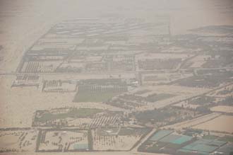 DXB Dubai from aircraft - residential area with trees on the border with the desert 04 3008x2000