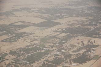 DXB Dubai from aircraft - residential area with trees on the border with the desert 06 3008x2000