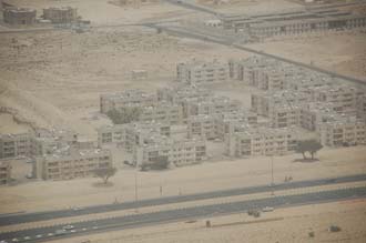 DXB Dubai from aircraft - residential housing near a highway 3008x2000