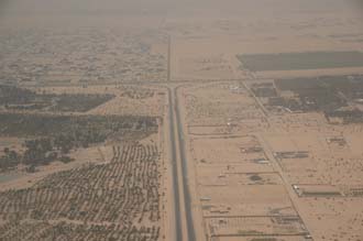 DXB Dubai from aircraft - road in the outskirts with trees 3008x2000