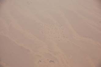 DXB Dubai from aircraft - small settlement in the desert 3008x2000