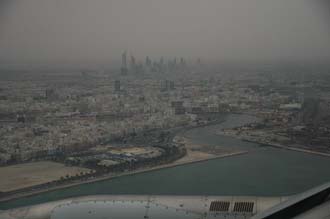 DXB Dubai from aircraft - the Dubai creek and the Jumeirah skyscrapers at dawn 3008x2000