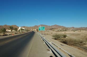 DXB Hatta - access road to Hatta with view towards the Hatta Fort Hotel and Hajar mountains and large wadi 3008x2000