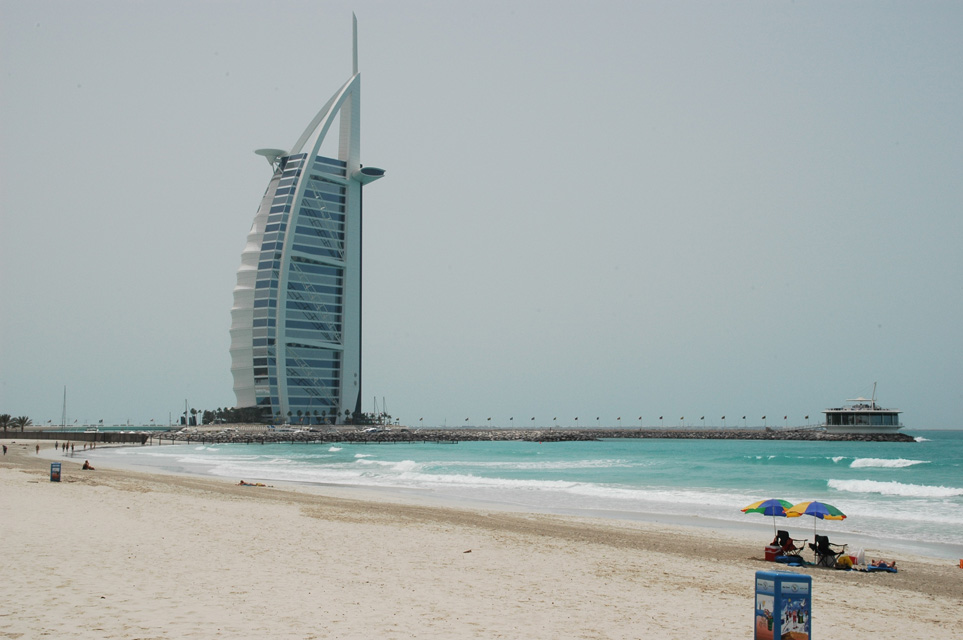 DXB Dubai Jumeirah Beach - Burj Al Arab Hotel with white sandy beach and sunshade 02 3008x2000