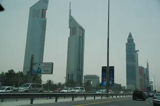 DXB Dubai Jumeirah Beach - Sheikh Zayed Road with the Emirates Towers and The Tower skyscrapers 01 3008x2000