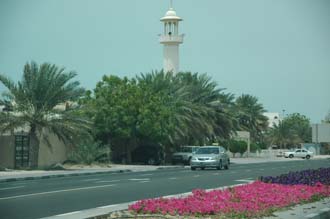 DXB Dubai Jumeirah Beach - mosque with minaret and flowers on Al Jumeirah Road 3008x2000