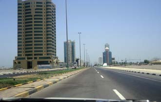 DXB Fujairah - Hamad bin Abdullah Road in Fujairah with Etisalat building 5340x3400